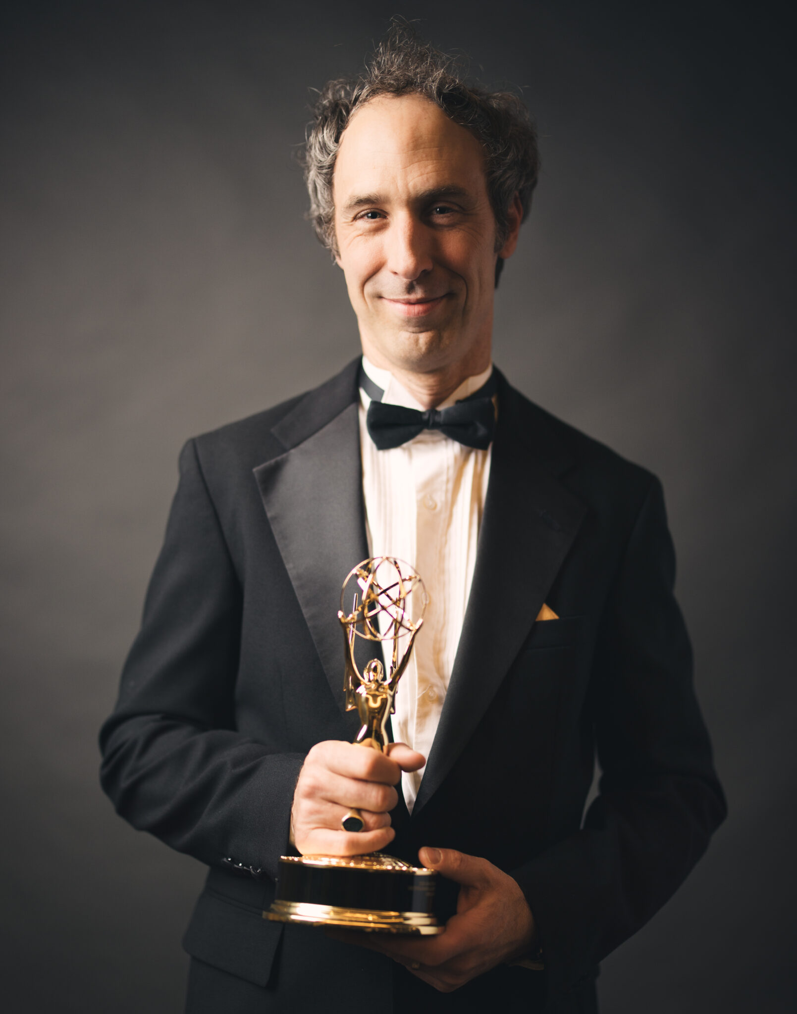 Andrew Twiss with his Emmy award for Outstanding Audio at the 2024 Chicago Midwest Emmy Awards.